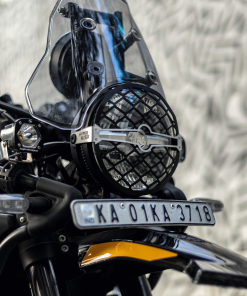 Black headlight grill for Hyperrider Himalayan 450, enhancing protection and style.